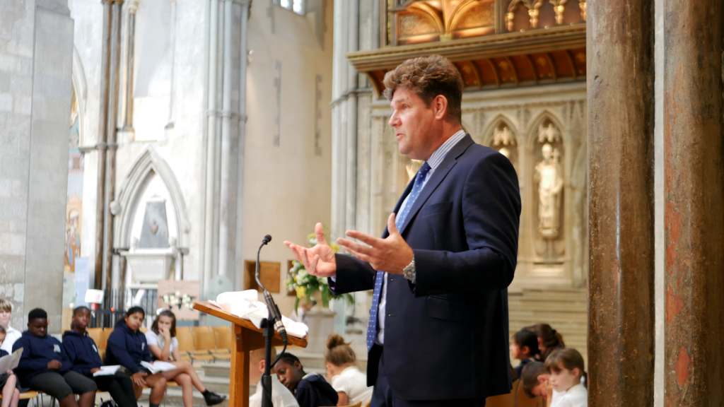 steve carey ceo giving a speech year 6 leavers celebration at rochester cathedral with aletheia academies trust