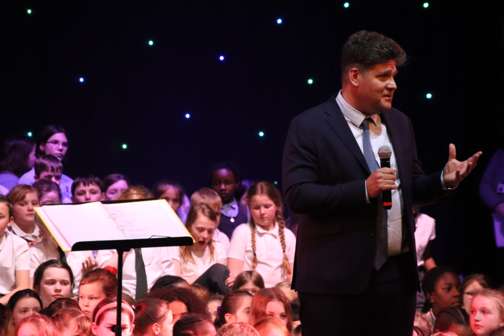 trust choir concert at the woodville hall in gravesend with aletheia academies trust with steve carey ceo giving a speech